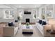 Bright living room featuring a fireplace, hardwood floors, and plenty of natural light at 1226 Pickens St, Hanahan, SC 29410