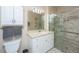 Bright bathroom featuring a glass enclosed shower, white vanity, and ample storage space at 130 River Landing Dr # 7123, Charleston, SC 29492