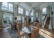 Elegant clubhouse featuring high ceilings, large windows, fireplace and comfortable seating areas at 130 River Landing Dr # 7123, Charleston, SC 29492
