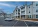 Apartment building with reserved parking and a view of the upper and lower porches at 130 River Landing Dr # 7123, Charleston, SC 29492