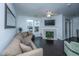 Comfortable living room features a fireplace and view of the window at 130 River Landing Dr # 7123, Charleston, SC 29492
