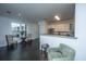 Bright and airy living space with dining area, kitchen and comfortable seating at 130 River Landing Dr # 7123, Charleston, SC 29492