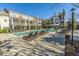 Resort-style pool with lounge chairs and well-maintained landscaping at this inviting apartment community at 130 River Landing Dr # 7123, Charleston, SC 29492