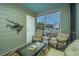 Inviting screened porch with comfortable seating and a view at 130 River Landing Dr # 7123, Charleston, SC 29492