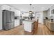 Stylish kitchen featuring white cabinets, stainless steel appliances, and a center island at 1317 Orange Grove Rd, Charleston, SC 29407