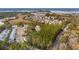 An aerial view of homes and townhomes in a suburban community surrounded by green space at 136 Fair Sailing Rd, Mount Pleasant, SC 29466