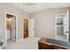 Bedroom with open doorway to ensuite bathroom and doorway to walk-in closet at 136 Fair Sailing Rd, Mount Pleasant, SC 29466