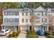Charming townhouses with garages and well-maintained landscaping creates a welcoming curb appeal at 136 Fair Sailing Rd, Mount Pleasant, SC 29466
