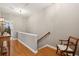 Hallway with hardwood floors, staircase, and natural light at 136 Fair Sailing Rd, Mount Pleasant, SC 29466