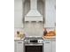 Modern kitchen featuring stainless steel appliances, a white range hood, and light countertops at 136 Fair Sailing Rd, Mount Pleasant, SC 29466
