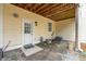 Covered patio with gravel stone, outdoor lighting, and yellow wall at 136 Fair Sailing Rd, Mount Pleasant, SC 29466