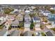 Aerial view of neighborhood featuring modern homes with private driveways and garages at 1433 Lettered Olive Ln, Mount Pleasant, SC 29464