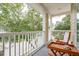 Cozy balcony with comfortable seating and serene views of the neighborhood at 1618 Folly Creek Way # B2, Charleston, SC 29412