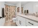 Bathroom featuring a shower, toilet, vanity and a floral-themed shower curtain, creating a cozy space at 1710 Sparkleberry Ln, Johns Island, SC 29455