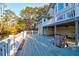 A spacious back deck offers serene views of the waterway and surrounding foliage at 1784 Omni Blvd, Mount Pleasant, SC 29466