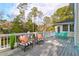 Relax on your spacious back deck with views of the surrounding trees and marsh at 1784 Omni Blvd, Mount Pleasant, SC 29466