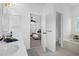 En-suite bathroom and bedroom view. Has soaking tub, walk-in shower, and double sinks at 1784 Omni Blvd, Mount Pleasant, SC 29466