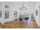 Bright dining area with modern chandelier and access to the outdoor area at 1784 Omni Blvd, Mount Pleasant, SC 29466