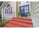 Elegant front entrance features double doors, brick steps, and decorative lanterns at 1784 Omni Blvd, Mount Pleasant, SC 29466