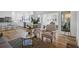Open-concept floor plan with hardwood floors, large windows, and a bright, open kitchen at 1784 Omni Blvd, Mount Pleasant, SC 29466