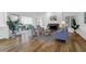This living room has hardwood floors, comfortable seating and a decorative fireplace at 1784 Omni Blvd, Mount Pleasant, SC 29466