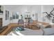 Open-concept living room with fireplace and access to the dining area at 1784 Omni Blvd, Mount Pleasant, SC 29466