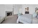 The primary suite offers a fireplace and light and airy palette at 1784 Omni Blvd, Mount Pleasant, SC 29466