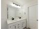 Bright bathroom featuring a double sink vanity and modern black fixtures at 187 Hayworth Rd, Summerville, SC 29486