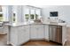 Modern kitchen featuring white cabinetry, stainless steel appliances, and light countertops at 200 Pine Crest View Dr, Summerville, SC 29486