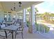Relax on this expansive covered porch, great for outdoor dining and entertaining with views of the community at 2006 Barn Swallow Rd, Summerville, SC 29483