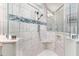 Sleek glass shower with white marble tile, a corner seat, and a mosaic tile accent at 2006 Barn Swallow Rd, Summerville, SC 29483