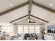 Inviting living room featuring vaulted ceilings, exposed beams, and abundant natural light at 2018 Mcguire Ln # 005, Hollywood, SC 29449