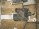 Aerial view of a home with a large driveway and backyard in a residential neighborhood at 203 Goldfinch Ln, Summerville, SC 29485
