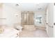 Bathroom with a large glass shower, tile flooring, and a window for natural light at 210 Lakeview Dr, Summerville, SC 29485