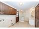 Full bathroom with a shower, tile flooring, cabinets, and door to the backyard at 210 Lakeview Dr, Summerville, SC 29485