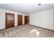 Bedroom featuring carpet, white walls, and closet with dark wood at 210 Lakeview Dr, Summerville, SC 29485