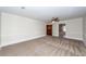 Large bedroom with neutral carpet, a ceiling fan, and attached bathroom at 210 Lakeview Dr, Summerville, SC 29485
