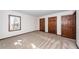 Bedroom featuring carpet, white walls, natural light and closet with dark wood at 210 Lakeview Dr, Summerville, SC 29485
