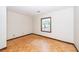 Bedroom featuring parquet floors, white walls, and natural light streaming through a window at 210 Lakeview Dr, Summerville, SC 29485