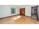 Bedroom featuring parquet floors, white walls, natural light and closet with dark wood at 210 Lakeview Dr, Summerville, SC 29485