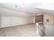 Large bonus room with carpet flooring, brick feature, and bright lighting at 210 Lakeview Dr, Summerville, SC 29485