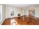 Spacious living room featuring hardwood floors, a fireplace, and natural light at 210 Lakeview Dr, Summerville, SC 29485