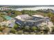 Aerial view of tennis stadium with bridge and waterway in background at 217 King George St, Daniel Island, SC 29492