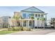 Exterior of the community building at The Kingstide with architectural details and landscaping at 217 King George St, Daniel Island, SC 29492
