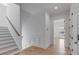 Hallway with stairs and wood floors at 217 King George St, Daniel Island, SC 29492