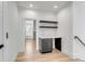 Hallway with a built-in desk and shelves at 217 King George St, Daniel Island, SC 29492