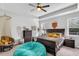 Cozy bedroom with decorative chair, ample natural light, and neutral tones at 229 Celestial Blvd, Summerville, SC 29486