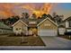 Charming single Gathering home featuring a two-car garage and landscaped front yard in a desirable neighborhood at 229 Celestial Blvd, Summerville, SC 29486