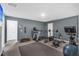 Home gym featuring modern exercise equipment, open space, and soft, shock-absorbent flooring at 229 Celestial Blvd, Summerville, SC 29486