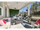 Inviting screened-in patio with a fire pit and outdoor seating, perfect for relaxing and entertaining at 229 Celestial Blvd, Summerville, SC 29486